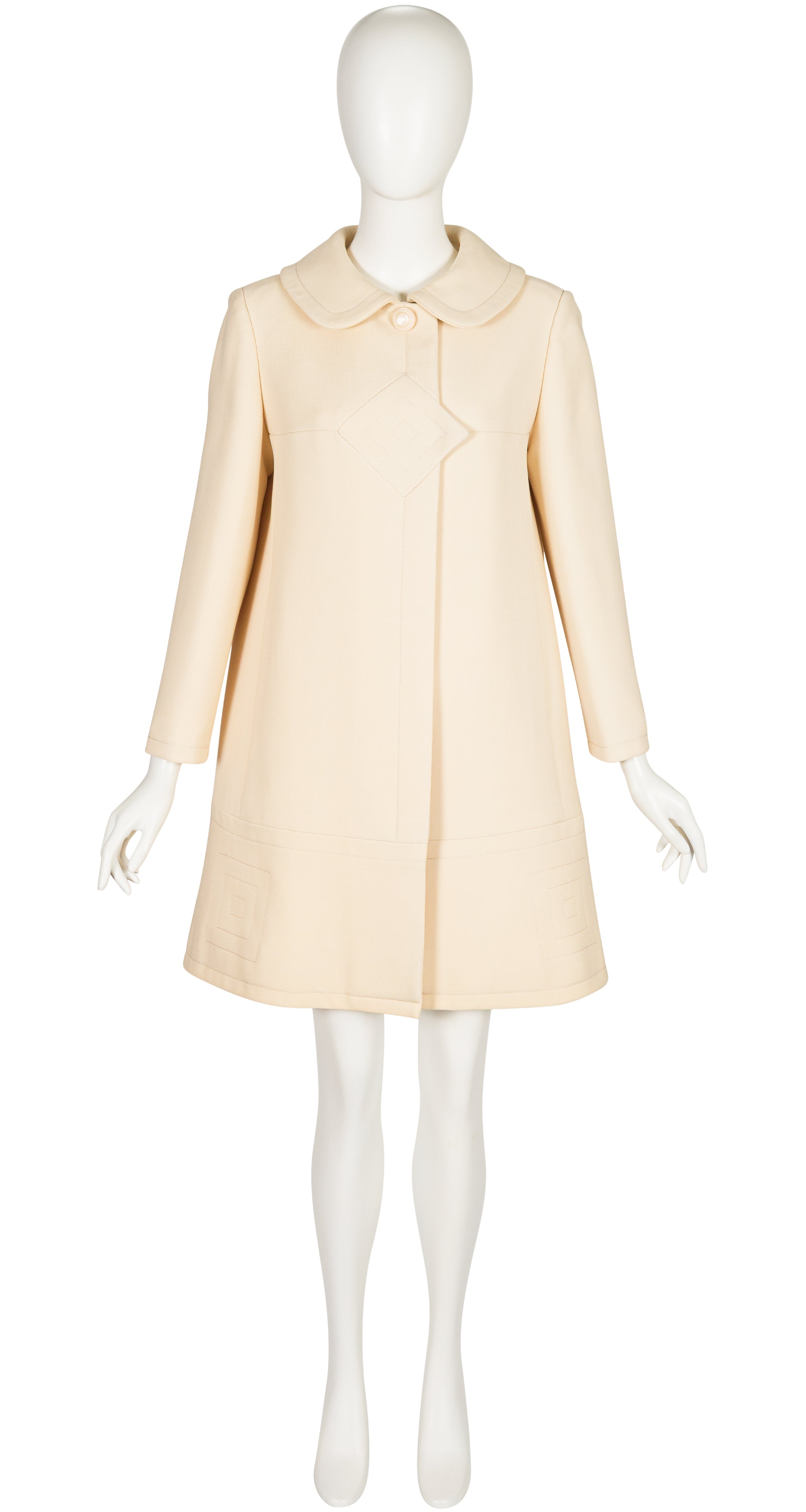 front of 1969 Pierre Cardin cream wool coat on mannequin