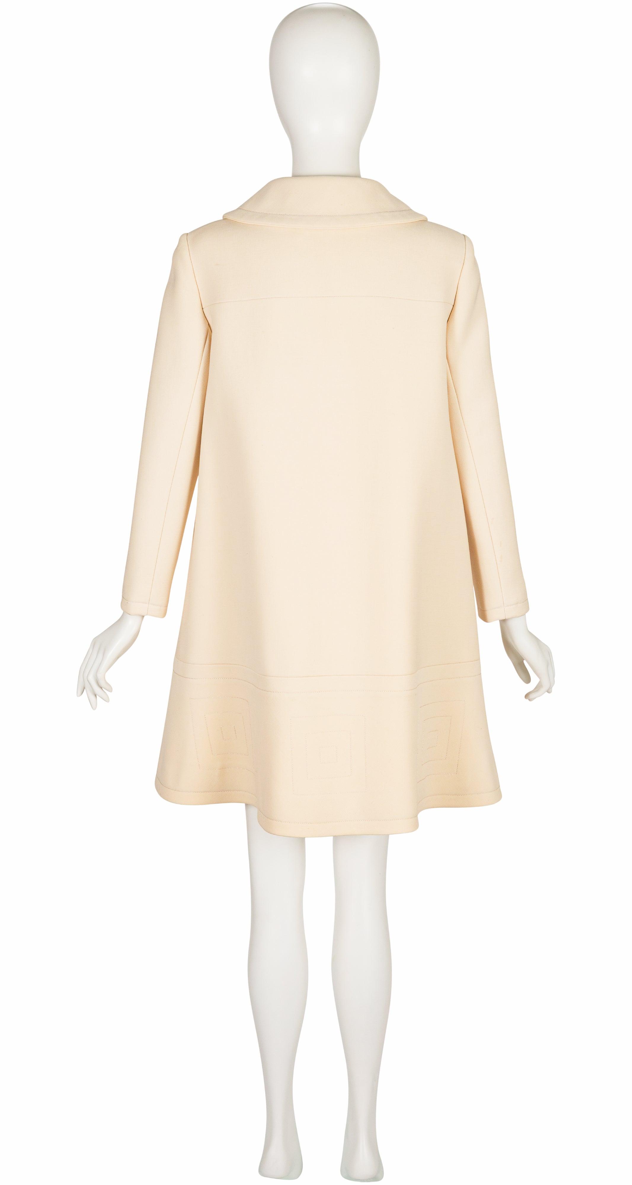 Bakc of 1969 Pierre Cardin cream wool coat on mannequin
