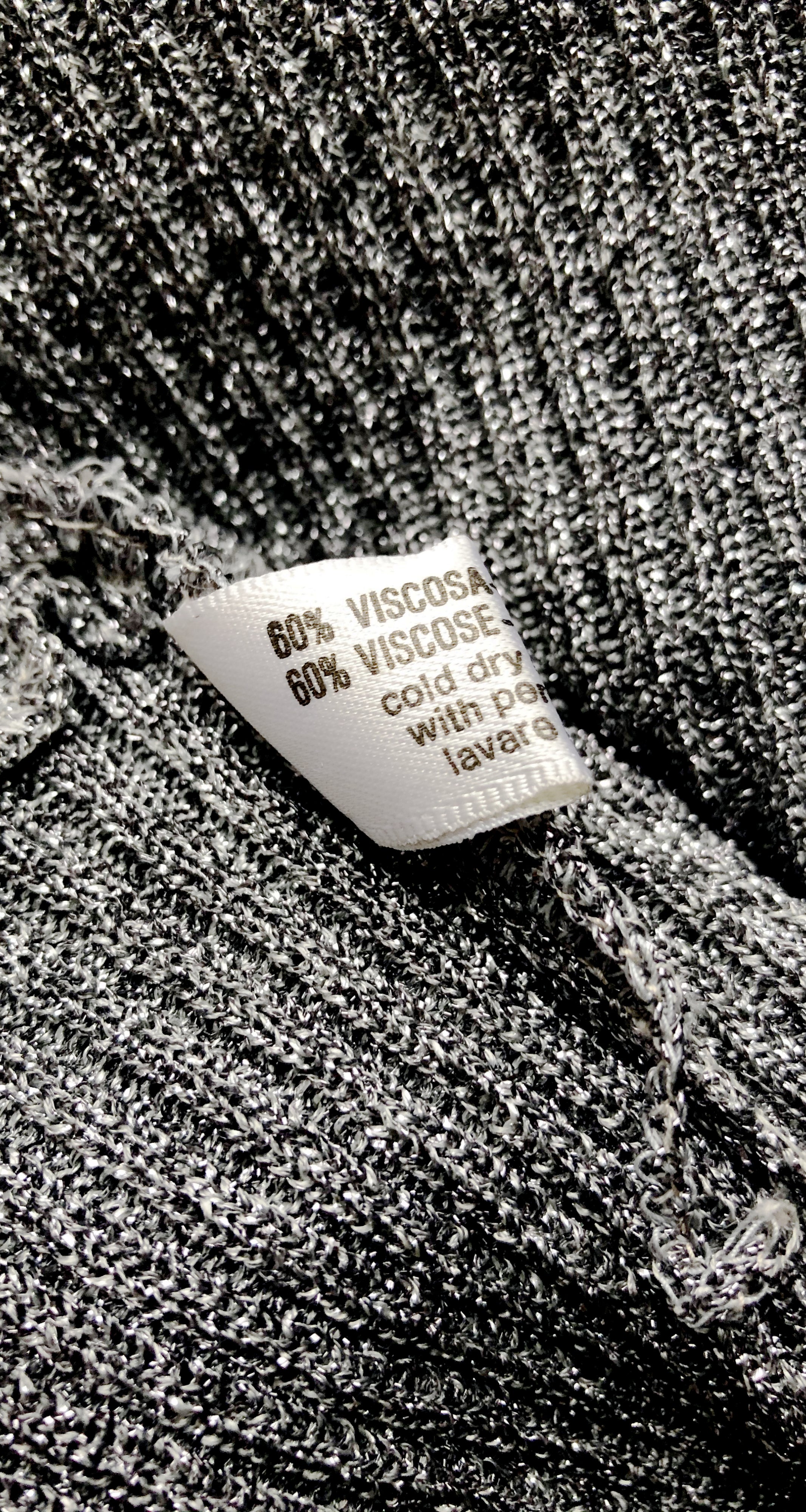 1980s Avant-Garde Feather Shoulder Silver Lurex Sweater