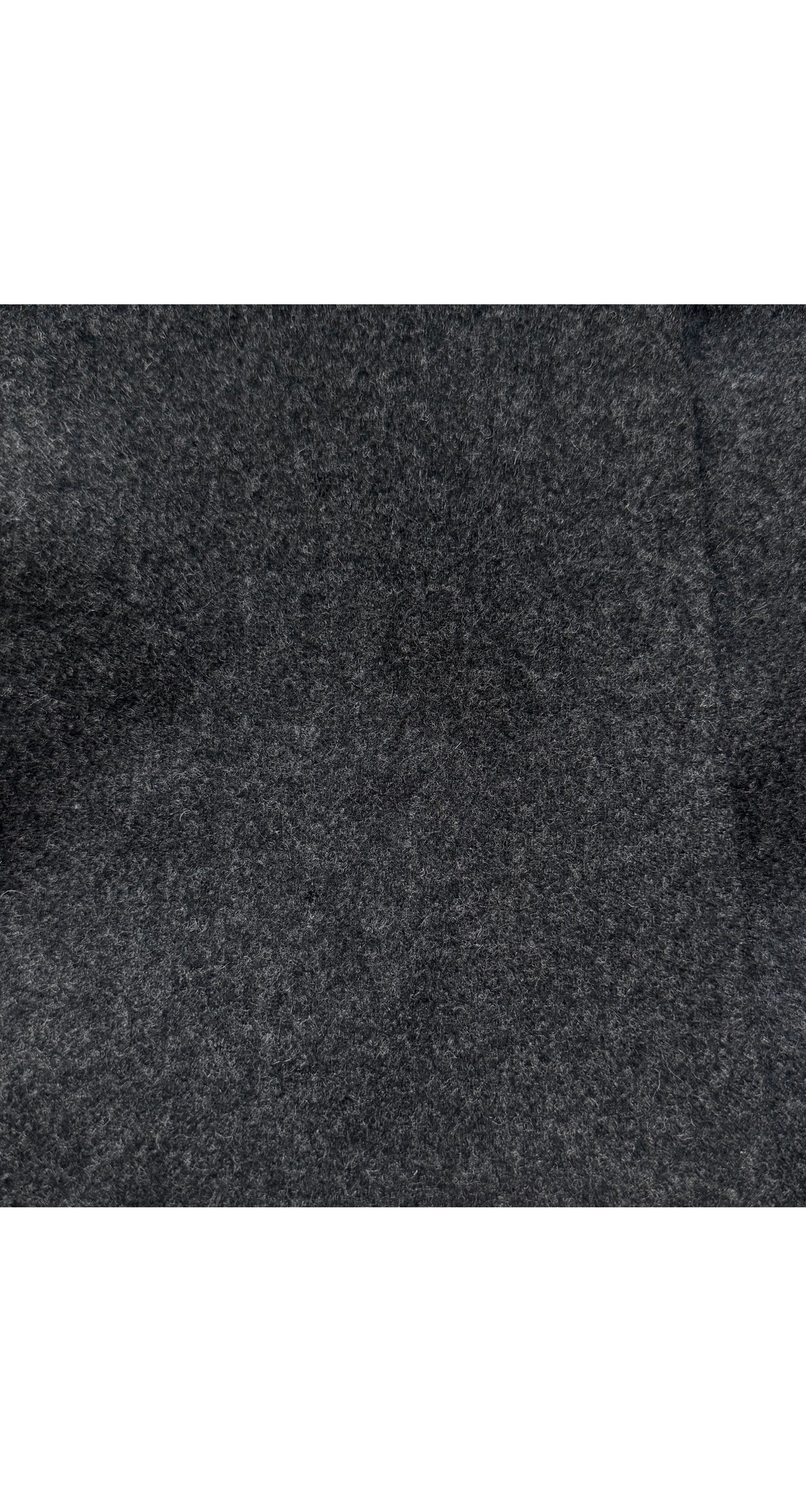 Gray wool fabric on Hermès skirt. 