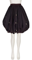 A Krizia 1980s pinstripe black bubble hem skirt with pearl teardrop beads on a white mannequin with a white background. 