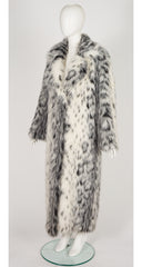 3/4 shot of 1970s faux lynx fur full-length coat on mannequin 