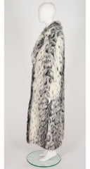 side of 1970s faux lynx fur full-length coat on mannequin 