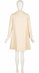 Bakc of 1969 Pierre Cardin cream wool coat on mannequin 