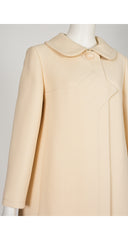 close up of 1969 Pierre Cardin cream wool coat on mannequin 