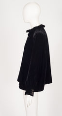 side of 2012 Gucci black velvet tassel blouse on mannequin 