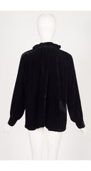 back of 2012 Gucci black velvet tassel blouse on mannequin 