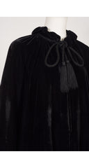 close up of 2012 Gucci black velvet tassel blouse on mannequin 