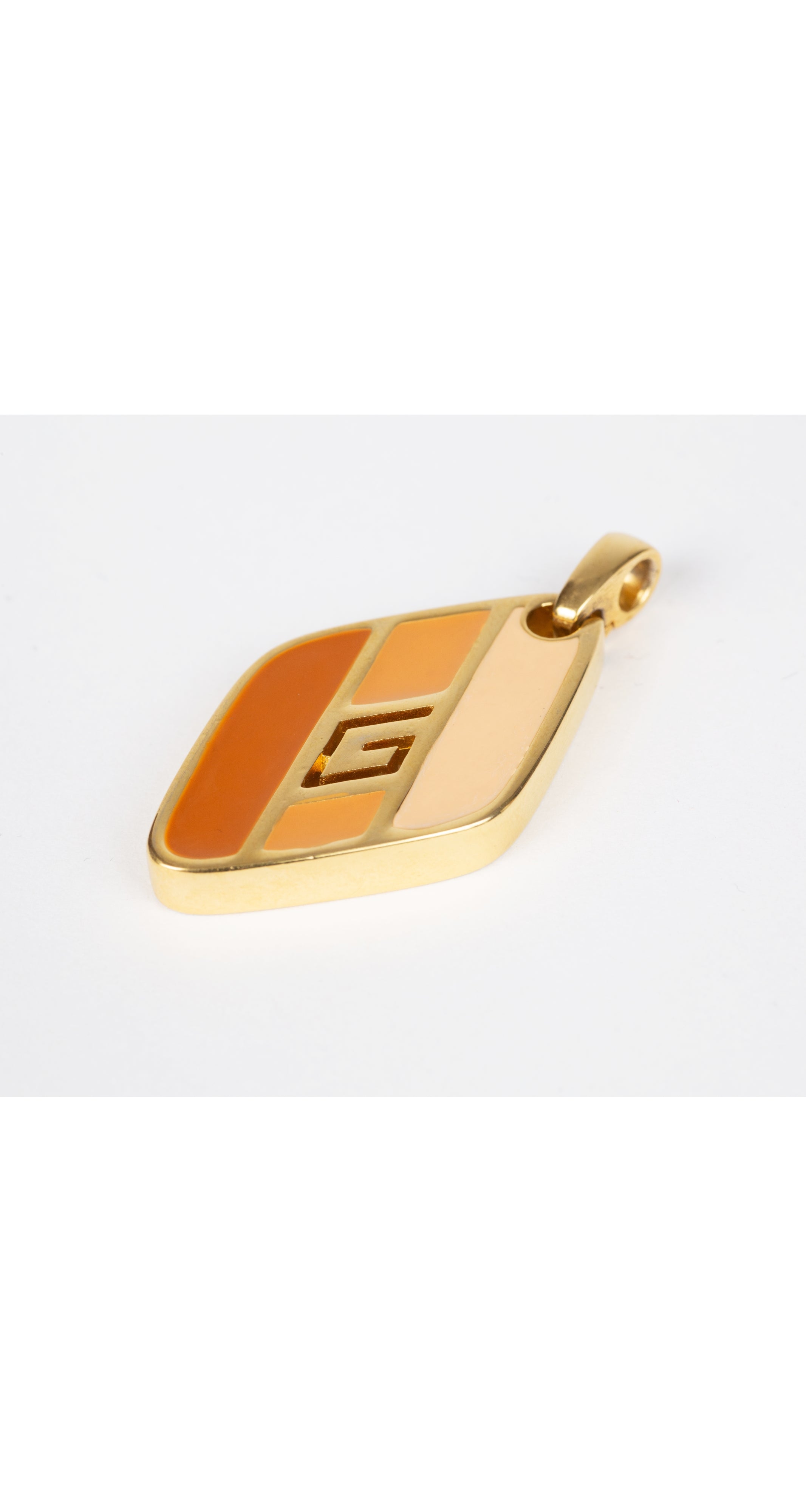 1979 "G" Logo Enamel Gold-Tone Pendant