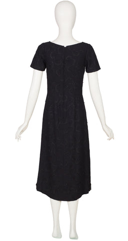 1960s Beaded Black Crepe Low Neck Evening Dress