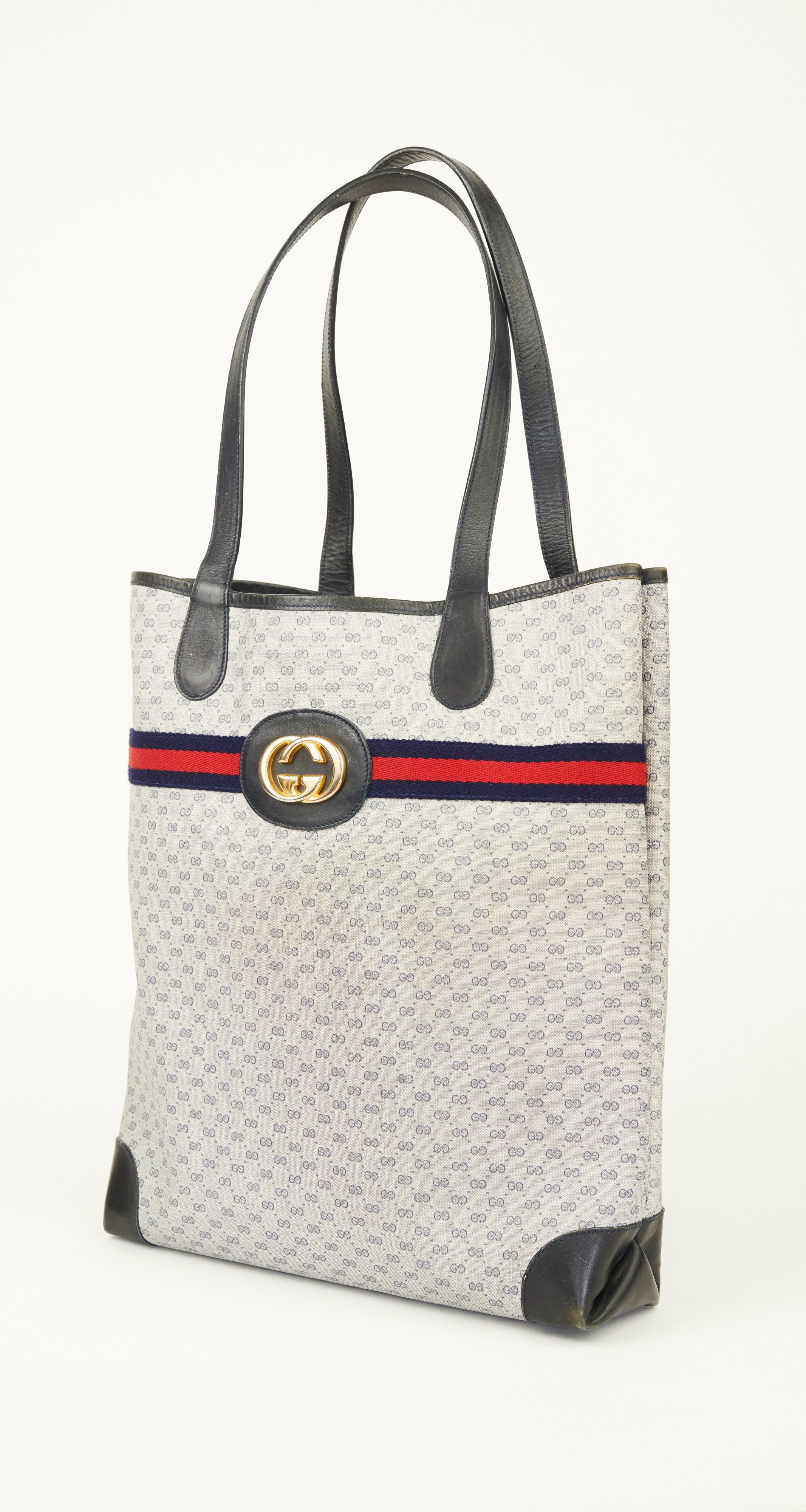 Gucci 1980s Navy Monogram Canvas and Leather Shoulder Bag – Featherstone  Vintage